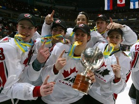 Members of Team Canada celebrate their victory against Team Russia during the gold medal game at the World Junior Hockey Championships at General Motors Place on January 5, 2006 in Vancouver, British Columbia, Canada. Team Canada defeated Team Russia 5-0 to win the gold medal.