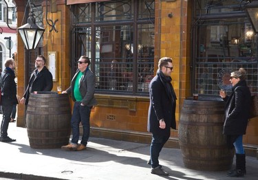 Enjoying a drink outside a pub near Borough Market.