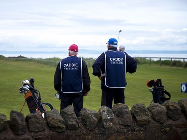 Caddies at the first tee – North Berwick Golf Club (West Links).