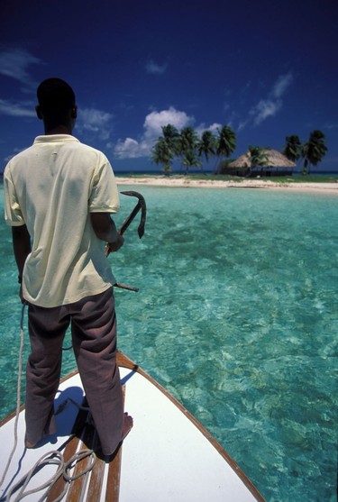 Geoff's Caye (a side trip from Caye Caulker, Belize) barely a few palms, a shade shed and a beach.