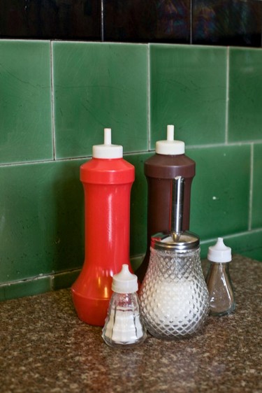 Details of condiments inside L.Rodi another excellent classic London caff.