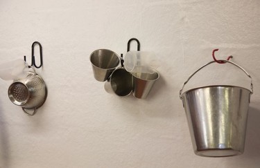 Various implements used during cheese making hang on the wall at  Shepherds Purse.