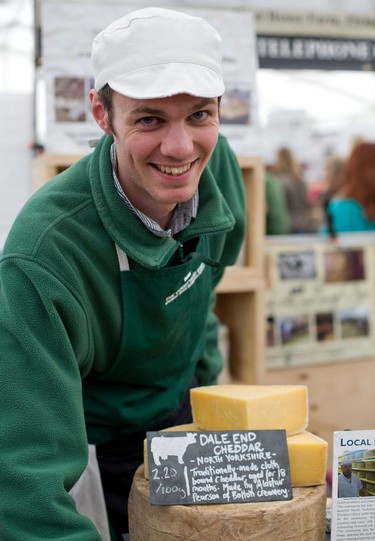 Andy Swinscoe (owner of the Courtyard Dairy in Settle) at his cheese stall during the Dales Festival of Food & Drink in Leyburn, Wensleydale.