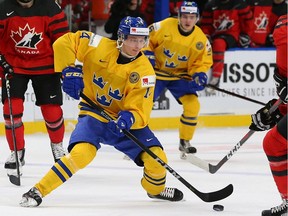 Elias Pettersson playing for Sweden at the 2018 World Junior Hockey Championship in Buffalo