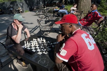 Challenge someone to a game of chess at Washington Square Park, Greenwich Village.