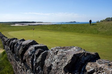 The classic par-4 13th  known as the 'Pit' (with the wall in front of the green) at North Berwick Golf Club.