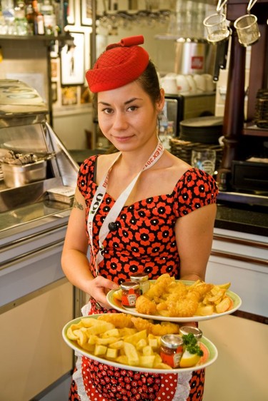 One of the colourful vintage attired waitresses at Poppies.