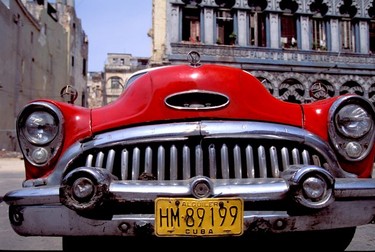 Classic Old Havana street scene and an old Buick car.