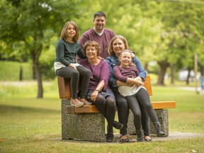 "It’s challenging for women with kidney disease to have children. My team at St. Paul’s knew I wanted a family and planned my treatment with that in mind.” Hayley Atkinson with husband Bill, mom and kidney donor Jeanne, daughters Rebecca and Liah.