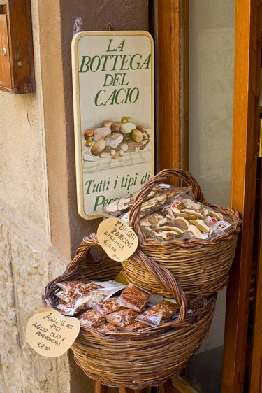 A selection of fungi and other produce for sale in Pienza.