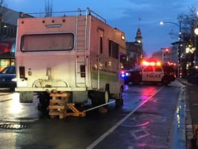 A pedestrian was trapped under a motorhome on Douglas Street in Victoria.