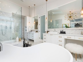 he hexagon Carrera marble floor tiles used throughout this 250-square-foot bathroom designed by Shauna Townsend, lead designer at Form Creative, are complemented by marble slabs on the walls adding to the fresh and airy mood.