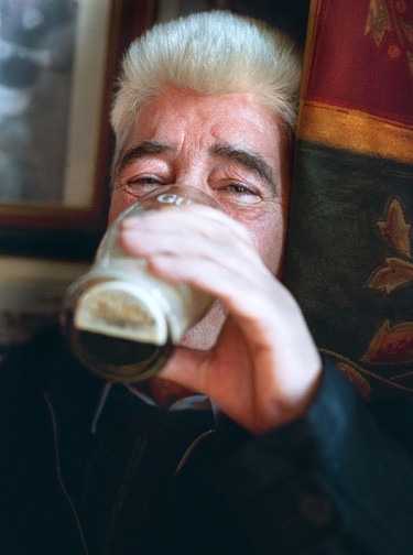 A Dubliner enjoys a pint of the Black Stuff (Guinness stout).