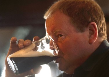 A Dubliner enjoys a pint of the Black Stuff (Guinness stout).
