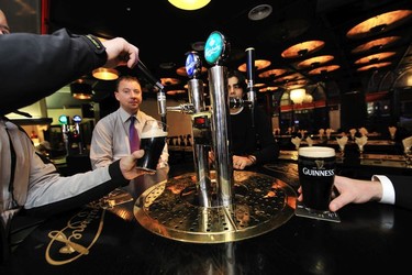 Guinness tap table inside a Dublin city pub.