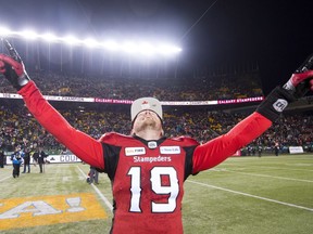 Calgary Stampeders quarterback Bo Levi Mitchell (19) celebrates his teams win over the Ottawa Redblacks in the 106th Grey Cup in Edmonton, Alta. Sunday, Nov. 25, 2018.