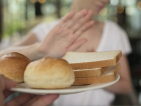Woman refuses to eat white bread.