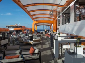 The Magic Carpet tender platform, which can traverse 13 decks and doubles as a restaurant, is just one of the new never-before-seen features aboard Celebrity Edge.