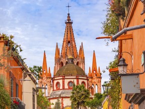 Aldama Street Parroquia Archangel church Dome Steeple San Miguel de Allende, Mexico. Parroaguia created in 1600s.