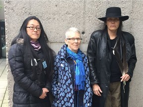 Pipeline protesters, from left, Rita Wong, Mairy Beam and Kat Roivas at B.C. Supreme Court in Vancouver for an application that Justice Kenneth Affleck step aside from the proceedings.