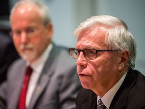 Clerk of the Legislative Assembly Craig James makes a statement to media near Sergeant-at-Arms Gary Lenz in Vancouver, B.C., on Monday November 26, 2018.