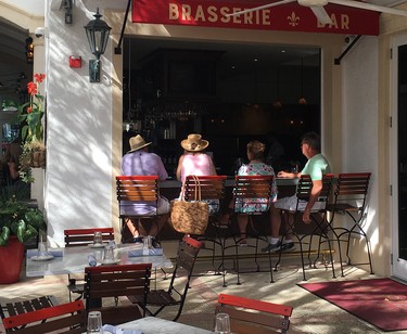 The open air bar at The French, a restaurant in Naples, is typical of Southwest Florida.