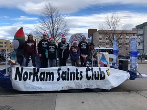 Members of the NorKam Secondary School Saints Club in Kamloops, BC, pose on their float for the Santa Parade on Saturday, November 25th, 2017.
