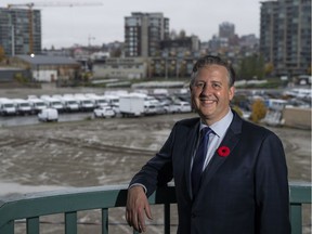 Mayor-elect Kennedy Stewart to a city-owned lot on the south shore of False Creek east of south end of Cambie Street Bridge where he wants to build affordable housing in Vancouver,