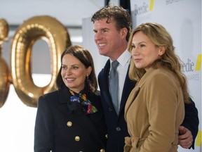 Ryan Beedie celebrated his 50th birthday by committing $50 million to a foundation called Beedie Luminaries to help students who cannot afford post-secondary education. He's shown with his wife, Cindy (left), and the executive director of Beedie Luminaries, Martina Meckova, at a launch event at  Moscrop Secondary School in Burnaby.