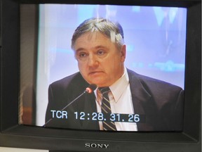 VANCOUVER BC APRIL 21 2009 - RCMP Sgt. Pierre Lemaitre testifies at the Braidwood Inquiry into the Tasering of Robert Dziekanski who died at the hands of police after arriving at Vancouver Airport from Poland. (shot on monitor in media room) (Jon Murray/Province)       (Fournier story) [PNG Merlin Archive]