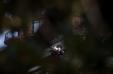 A bugler plays the Last Post during a Remembrance Day ceremony in Vancouver, on Sunday, November 11, 2018.