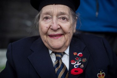 Royal Canadian Air Force veteran Colleen de Serres, 86, who flew the Tiger Moth single engine aircraft in France during the Korean War, attends a Remembrance Day ceremony in Vancouver, on Sunday, November 11, 2018. Her great-uncle is Canadian aviation pioneer Douglas McCurdy.