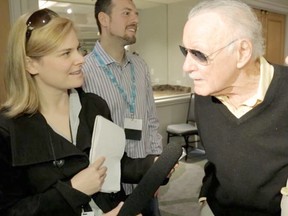 Postmedia reporter Tiffany Crawford (left) talks to Stan Lee before the 2013 Fan Expo Saturday.