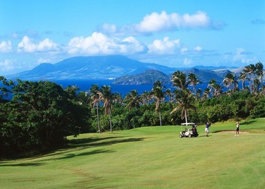 Robert Trent Jones Jr Championship Course in Nevis, with swaying palms and spectacular views of the neighbouring island such as St. Kitts.