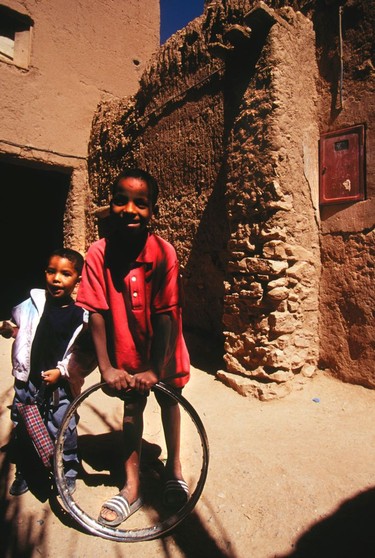 Marrakech to the Sahara Local boys at play, High Atlas Mountains.
