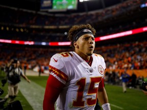 Quarterback Patrick Mahomes of the Kansas City Chiefs celebrates a Monday Night Football 27-23 win over the Denver Broncos in NFL action at Broncos Stadium at Mile High in Denver, Colo.