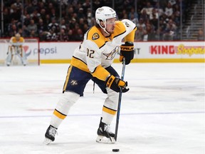 yan Johansen #92 of the Nashville Predators looks for a shot on goal against the Colorado Avalanche in the first period at the Pepsi Center on November 7, 2018 in Denver, Colorado.