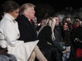 Donald Trump Jr. with his girlfriend Kimberly Guilfoyle and Tiffany Trump attend the National Christmas Tree lighting ceremony held by the National Park Service at the Ellipse near the White House on November 28, 2018 in Washington, DC.