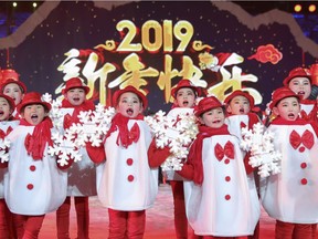 People celebrate the New Year in Beijing, China.