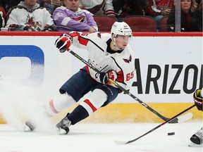 Andre Burakovsky the Washington Capitals skates with the puck against Oliver Ekman-Larsson of the Arizona Coyotes during the second period of the NHL game at Gila River Arena on December 6, 2018 in Glendale, Arizona. The Capitals defeated the Coyotes 4-2.