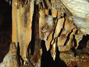 Ancient images of disfigured hands are shown at the Cosquer Cave near Marseille, France.