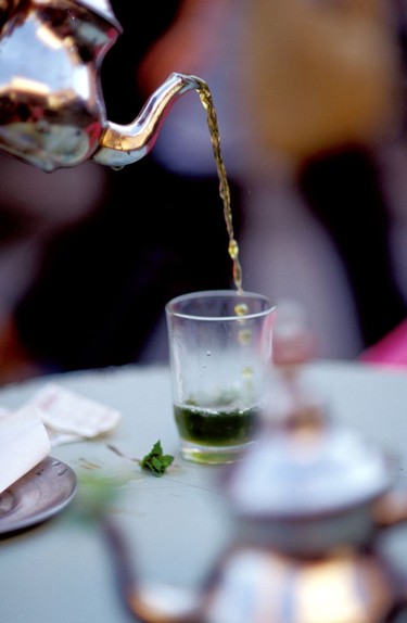 Sweet mint tea is available throughout Morocco in cafes and stalls (café in Marrakech).