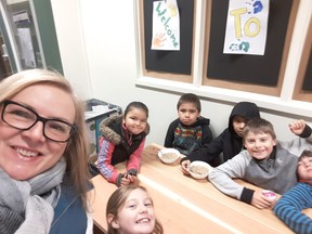 Dec. 13, 2018 - A selfie by Aboriginal Education teacher Laurene Klyne with some children at breakfast in Alexander Elementary. Submitted.  [PNG Merlin Archive]