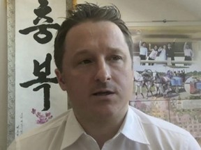 In this image made from video taken on March 2, 2017, Michael Spavor, director of Paektu Cultural Exchange, talks during a Skype interview in Yangi, China.