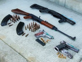 Weapons seized in the VPD's "Project Temper, a three-month operation that resulted in the dismantling of a violent and organized Vancouver-based crime group.