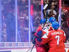 Czech Republic's Martin Kaut, left, and his teammates celebrate his goal against Switzerland during second period world junior hockey championship action in Vancouver, on Wednesday December 26, 2018.