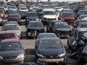 Damaged vehicles are seen at ICBC's Lower Mainland Salvage Yard.