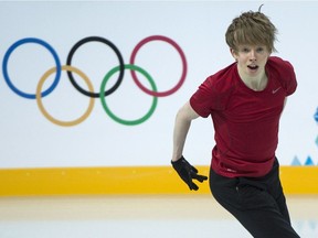Canada's Kevin Reynolds skates his routine during a practice session at the Sochi Winter Olympics Tuesday, February 4, 2014 in Sochi.