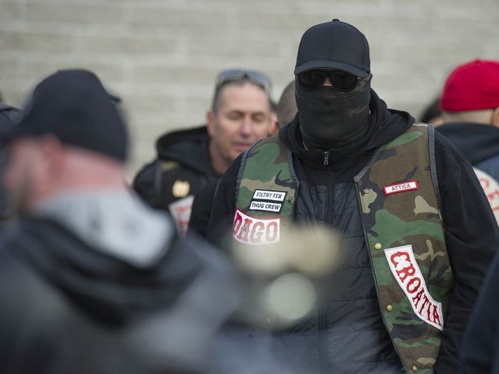  Hells Angel Damion Ryan, who is based in Greece, wore a scarf over his face at Chad Wilson’s funeral