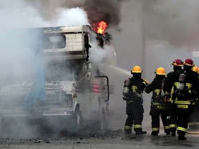 Vancouver firefighters put out a fire that broke out in a parked RV on Christmas Day.